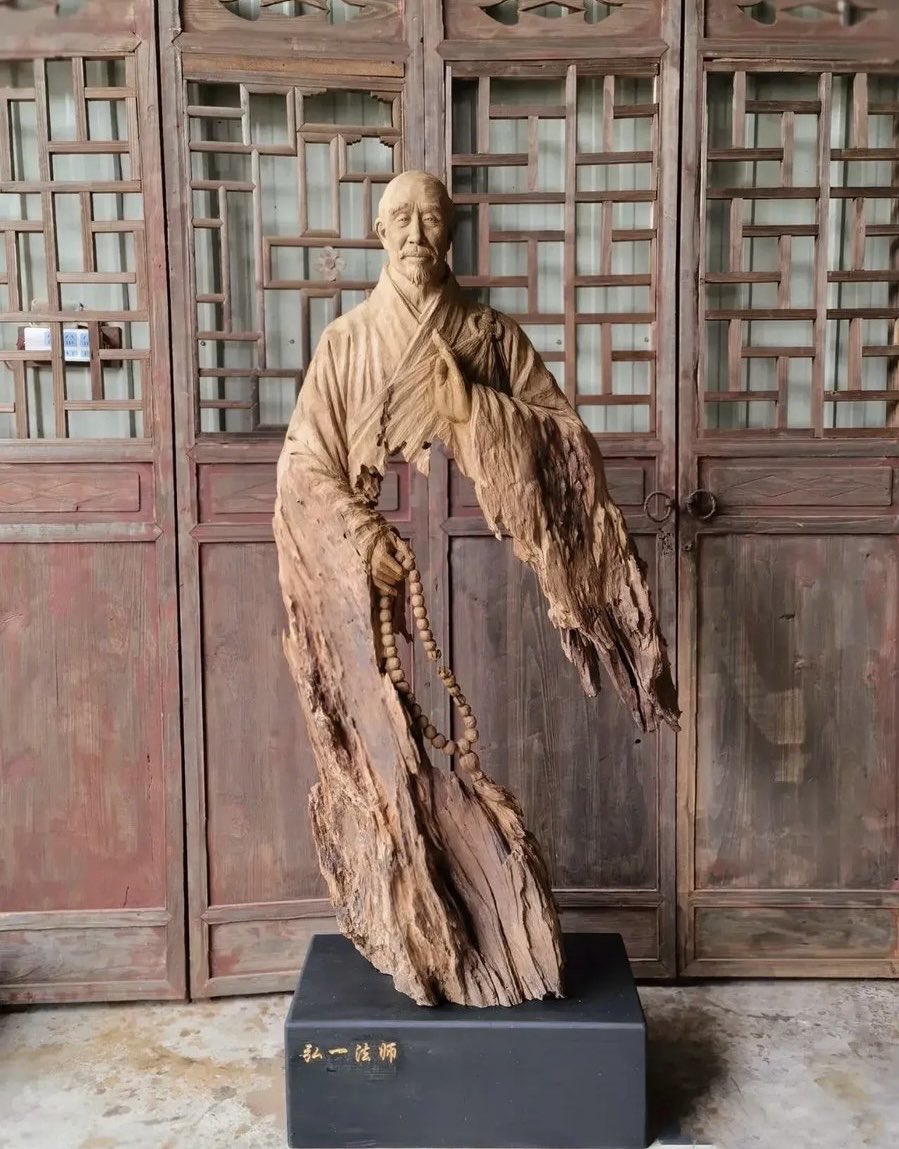 Striking Wooden Sculpture of a Monk