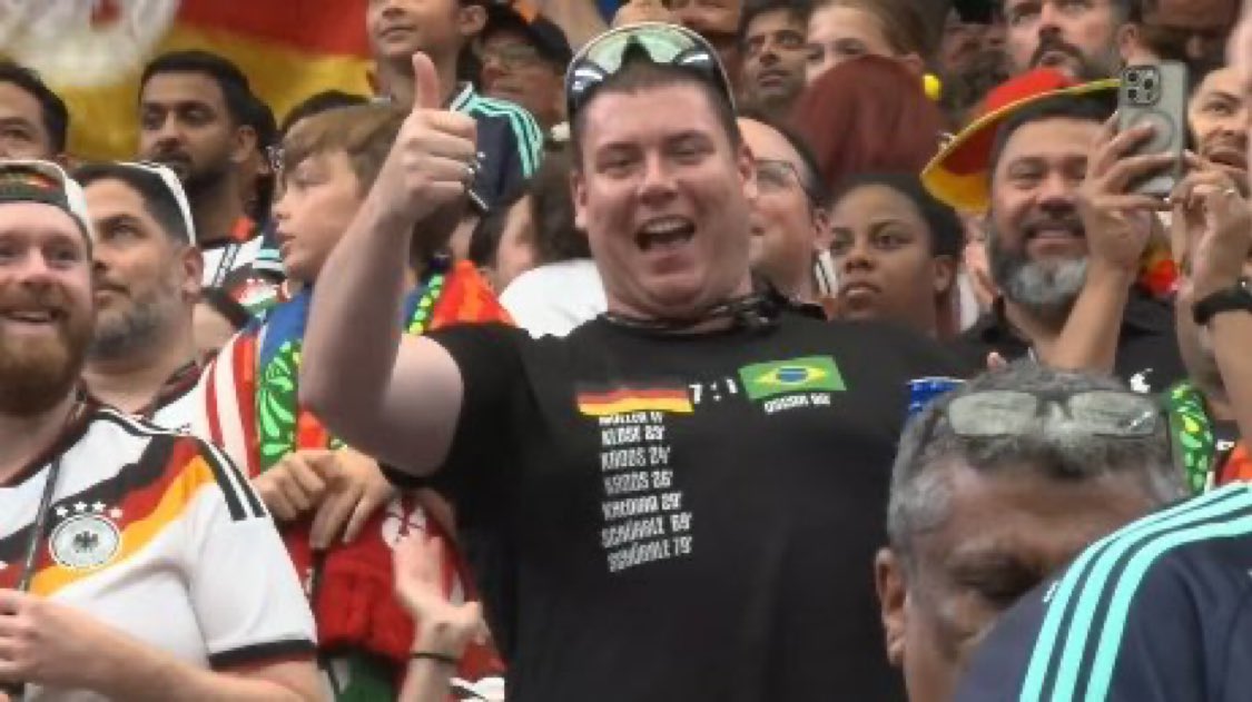 Fan celebrates Germany's 7-1 victory over Brazil