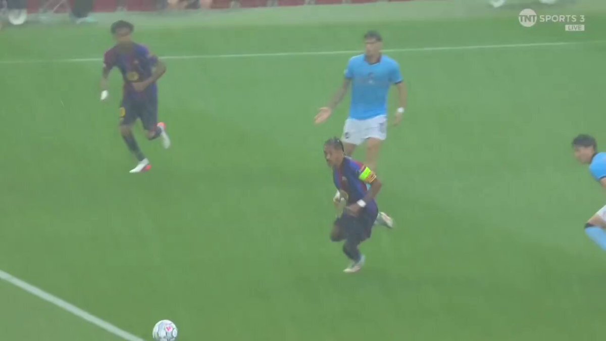 Footballer Neymar dribbles past defenders and scores